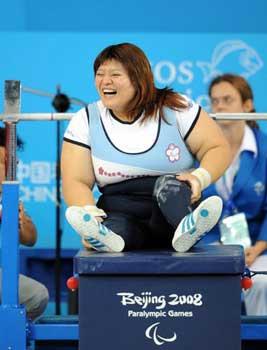 Lin Tzu-hui celebrates after her win.