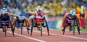 China's Zhou Hongzhuan won the gold of the Women's 800m - T53 with a time of one minute and 57.25 seconds at the National Stadium,also known as the Bird's Nest,during the Beijing 2008 Paralympic Games on September 15, 2008. [Xinhua]
