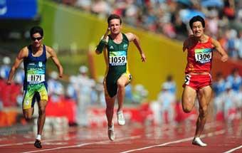 Australia's Heath Francis (C), with a time of 11.05 seconds, claimed the Men's 100m T46 gold medal at the National Stadium,also known as the Bird's Nest,during the Beijing 2008 Paralympic Games in Beijing on September 15, 2008. [Xinhua]