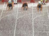 Perseverence of audience in heavy rain encourages athletes   