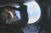 Astronauts perform E.V.A.