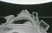 Astronaut exits orbital  module