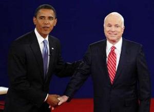 Democratic presidential nominee Senator Barack Obama (L) (D-IL) and Republican presidential nominee Senator John McCain (R) (R-AZ) greet each other at the beginning of the presidential debate at Belmont University in Nashville, Tennessee October 7, 2008.REUTERS/Rick Wilking (UNITED STATES)