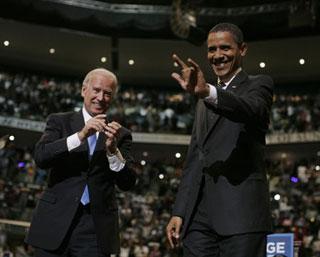 U.S. Democratic Presidential nominee Senator Barack Obama and his Vice Presidential nominee Senator Joe Biden (L) wave to supporters during a campaign rally in Sunrise, Florida, October 29, 2008.(Xinhua/Reuters Photo)