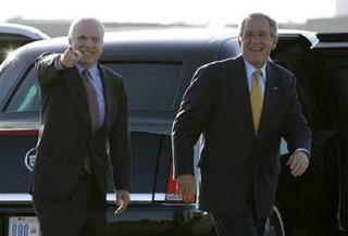 U.S. President George W. Bush smiles next to Republican Presidential candidate John McCain at Sky Harbor Airport after Bush spoke at a McCain campaign fund raising event in Phoenix, Arizona, May 27, 2008.REUTERS/Kevin Lamarque