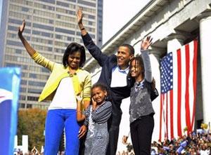 US Democratic presidential candidate Illinois Senator Barack Obama, his wife Michelle and daughters Sasha, 7, and Malia, 10, wave during a rally at Ohio State House in Columbus, Ohio.(AFP/Emmanuel Dunand)