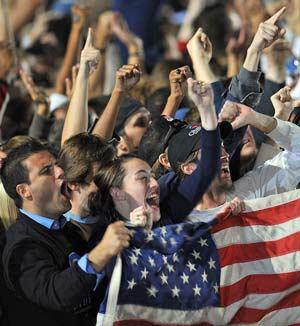 Supporters of Democratic presidential candidate Barack Obama cheer as they arrive at Grant Park on election day in Chicago, where later on election night Obama is to address a rally of more than one million people.(Xinhua/AFP Photo)