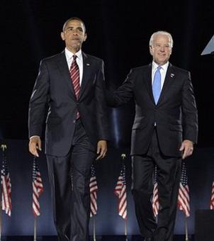 President-elect Barack Obama, left, and Vice President-elect Joe Biden celebrate after Obama's acceptance speech at the election night rally in Chicago, Tuesday, Nov. 4, 2008.(AP Photo/Jae C. Hong)