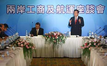 Mainland's Association for Relations Across the Taiwan Straits (ARATS) President Chen Yunlin(R) and Taiwan-based Straits Exchange Foundation (SEF) Chairman Chiang Pin-kung attend the symposia on industry and shipping in Taipei, southeast China's Taiwan Province, Nov. 5, 2008. They attended two symposia, one on industry and shipping and the other on finance, that were held against the backdrop of international financial crisis and struggling world economy in Taipei on Wednesday.(Xinhua Photo)