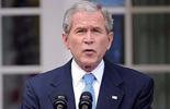 Bush promises "complete cooperation" with Obama