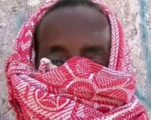 A video grab from an undated television footage shows an unidentified pirate speaking directly to camera in the town of Eyl in the north of Somalia.(REUTERS/Reuters TV)
