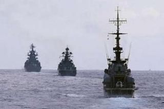 Russia's anti-submarine destroyer, Admiral Chabanenko (C) and Venezuelan Frigate F-21 'Mariscal Sucre' (R) follow the Russian nuclear-powered cruiser Pyotr Veliky or "Peter the Great" as they conduct a joint naval exercises in the Caribbean sea December 2, 2008. A fleet of Russian warships are conducting a joint naval exercises with Venezuela.REUTERS/ABN-Maiquel Torcatt