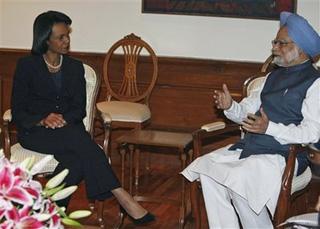 U.S. Secretary of State Condoleezza Rice, left, talks with Indian Prime Minister Manmohan Singh during a meeting at his residence in New Delhi, India, Wednesday, Dec. 3, 2008.(AP Photo/Mustafa Quraishi)