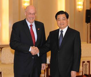 Chinese President Hu Jintao (R) meets with United States Treasury Secretary Henry Paulson at the Great Hall of the People in Beijing, capital of China, Dec. 5, 2008.(Xinhua Photo)