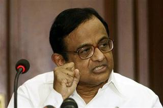 India's Home Minister Palaniappan Chidambaram gestures during a press conference in Mumbai, India, Friday, Dec. 5, 2008. Chidambaram said Friday 'there have been lapses' on the government's part in last week's Mumbai attacks.(AP Photo/Gautam Singh)