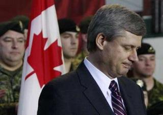 Canada's Prime Minister Stephen Harper pauses while delivering a speech at Canadian Forces Base Petawawa in Petawawa, Ontario December 5, 2008.REUTERS/Chris Wattie