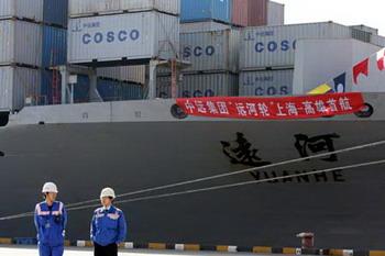 Container ship "Yuanhe" of China Ocean Shipping (Group) Company (COSCO) departs for Kaohsiung Port in southeast China's Taiwan, from Yangshan Deep-water Port in Shanghai, east China, Dec. 15, 2008. The Chinese mainland and Taiwan started direct air and sea transport and postal services Monday morning.(Xinhua/Liu Ying)