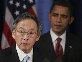 President-elect Barack Obama listens as Energy Secretary nominee Steven Chu addresses the media at a news conference in Chicago, Monday, Dec. 15, 2008.(AP Photo)