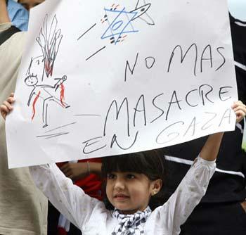 A Palestinian girl demonstrates in front of the Israeli Embassy in Caracas, capital of Venezuela, on Dec. 29, 2008. Palestinians who reside in Venezuela gathered here on Monday during a demonstration against Israeli airstrikes on the Gaza Strip. (Xinhua/Bolivar News Agency)