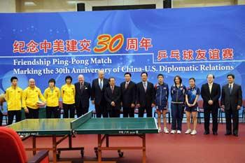 Chinese Vice Foreign Minister Wang Guangya (8th L) and U.S. Deputy Secretary of State John D. Negroponte (6th L) pose for a group photo during the Friendship Ping-pong Match marking the 30th anniversary of the establishment of the China-U.S. diplomatic relations, at the State General Administration of Sport in Beijing, capital of China, Jan. 7, 2009. In 1971, a U.S. ping-pong team visited China after years of estrangement and antagonism between the two countries, opening the door for the China-U.S. people-to-people contacts.(Xinhua/Rao Aimin) 