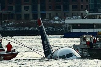 The US Airways plane floating in the water after crashing into the Hudson River in New York.(AFP/Getty Images/Chris Mcgrath)