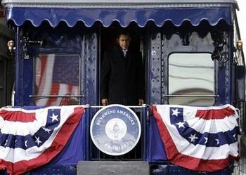 President-elect Barack Obama is seen as his train pulls away in Wilmington, Del., Saturday, Jan. 17, 2009, during his inaugural whistle stop train tour to Washington.(AP Photo/Matt Rourke)