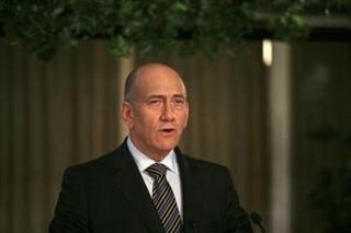 Israel's Prime Minister Ehud Olmert speaks during a joint news conference with European leaders in Jerusalem January 18, 2009. (Uriel Sinai/Pool/Reuters)