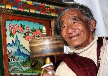 File photo taken on Jan. 14, 2009 shows Awang, once a serf, enjoys his life in a welfare institution in Lhasa, capital of southwest China's Tibet Autonomous Region.(Xinhua/Chogo)