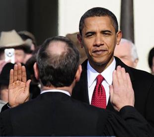 Barack Obama swears in as the 44th president of the United States of America in front of the U.S. Capitol in Washington D.C. Jan. 20, 2009. (Xinhua/Zhang Yan)