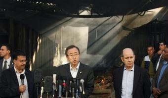 U.N. Secretary-General Ban Ki-moon, center, speaks to the media as sunlight beams through the damaged roof of the still-smoldering warehouse at the U.N. headquarters in Gaza City in the northern Gaza strip, Tuesday, Jan. 20, 2009. Ban inspected the devastation wrought by Israel's onslaught in Gaza on Tuesday, leading a moment of silence at the U.N. headquarters, as the territory's militant Hamas rulers, triumphant at having survived, held victory rallies amid the ruins.(AP Photo/Ben Curtis)