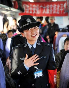 A train steward sings for passengers on the train from Beijing, capital of China, to Yinchuan, capital of northwest China's Ningxia Hui Autonomous Region, Jan. 20, 2009.(Xinhua/Wang Peng)