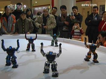 At a science museum in Beijing, five robots are welcoming visitors with New Year's greetings.