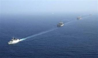 In this photo released by China's Xinhua News Agency, China's missile destroyer Wuhan leads Chinese ships sailing in the Gulf of Aden off Somalia Tuesday, Jan. 6, 2009. The Chinese naval fleet arrived in the area on Tuesday to carry out the first escort mission against pirates, Xinhua said.(AP Photo/Xinhua, Qian Xiaohu)