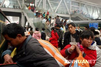 Beijing transport authorities estimate that 300,000 people will arrive in Beijing by train on Saturday.