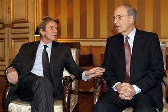 U.S. President Barack Obama's new Mideast envoy, George Mitchell, right, meets with French Foreign Minister Bernard Kouchner, left, at the Foreign Ministry in Paris, Monday, Feb. 2, 2009. (AP Photo/Christophe Ena)