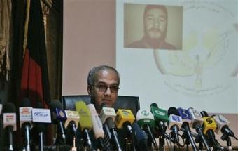 Sayed Ansari, spokesman for the National Directorate of Security(NDS), speaks during a news conference as the photographer of one of the suspected involved in a suicide attacks is displayed, at an NDS office in Kabul, Afghanistan, Tuesday, Feb. 3, 2009.(AP Photo/Rafiq Maqbool)