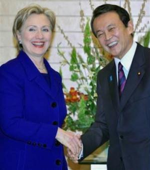 Secretary of State Hillary Rodham Clinton, left, and Japanese Prime Minister Taro Aso pose for photo prior to their talks at Aso's official residence in Tokyo, Tuesday, Feb. 17, 2009.(AP Photo/Toru Yamanaka, Pool)