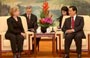 China, US pledge to advance ties and share responsibility