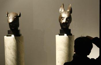 A court in France will rule on a motion put forward by a group of Chinese lawyers who are trying to stop the auction house Christie's from selling two relics looted from Beijing's old summer palace.