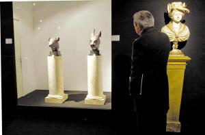 The two bronze statue heads represent just a small portion of the Chinese cultural relics lost overseas. 