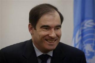 John Ging, the head of Gaza operations for the U.N. Relief and Works Agency, UNRWA, smiles during an interview with The Associated Press in Gaza City, Thursday, Feb. 26, 2009. (AP Photo/Khalil Hamra)