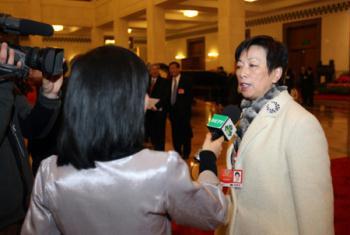 Selina Chow Liang Shuk-yee (R), member of the 11th National Committee of the Chinese People's Political Consultative Conference (CPPCC), receives interview at the Great Hall of the People in Beijing, March 3, 2009. The Second Session of the 11th National Committee of the CPPCC opened on Tuesday. (Xinhua Photo)