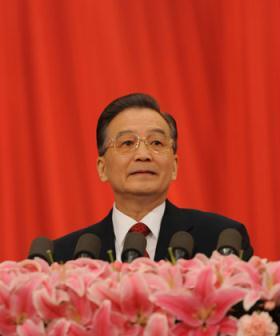 Chinese Premier Wen Jiabao delivers a government work report during the opening meeting of the Second Session of the 11th National People's Congress (NPC) at the Great Hall of the People in Beijing, capital of China, March 5, 2009. (Xinhua/Fan Rujun)