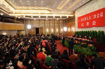 Press conference on dealing with the global financial crisis and maintaining steady and relatively rapid economic growth is held by the Second Session of the 11th National People's Congress (NPC) at the Great Hall of the People in Beijing, capital of China, March 6, 2009. (Xinhua/Rao Aimin)