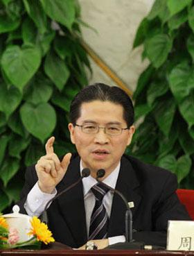 Zhou Hanmin, member of the 11th National Committee of the Chinese People's Political Consultative Conference (CPPCC), answers questions during a press conference on the World Expo 2010 to be held in Shanghai, held by the Second Session of the 11th National Committee of the CPPCC in Beijing, capital of China, March 8, 2009. Wan Jifei, Zhou Hanmin, Cheng Yuechong and Yang Lan, members of the 11th National Committee of the CPPCC, attended the press conference. (Xinhua/Xing Guangli)