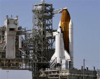 Space Shuttle Discovery sits on pad 39A at the Kennedy Space Station, Fla. ready for launch Wednesday March 11, 2009.(AP Photo/John Raoux)