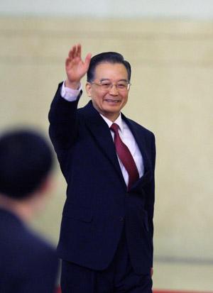 Chinese Premier Wen Jiabao met the press at the end of the closing meeting of the Second Session of the 11th National People's Congress (NPC), China's top legislature Friday morning in Beijing.(Xinhua Photo)
