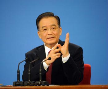Chinese Premier Wen Jiabao answers questions during a press conference after the closing meeting of the Second Session of the 11th National People's Congress (NPC) at the Great Hall of the People in Beijing, capital of China, March 13, 2009. The annual NPC session closed on Friday. (Xinhua Photo)