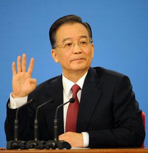 Chinese Premier Wen Jiabao answers questions during a press conference after the closing meeting of the Second Session of the 11th National People's Congress (NPC) at the Great Hall of the People in Beijing, capital of China, March 13, 2009. The annual NPC session closed on Friday. (Xinhua Photo)