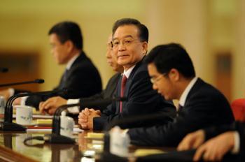 Chinese Premier Wen Jiabao (2nd R) attends a press conference after the closing meeting of the Second Session of the 11th National People's Congress (NPC) at the Great Hall of the People in Beijing, capital of China, March 13, 2009. The annual NPC session closed on Friday. (Xinhua Photo)